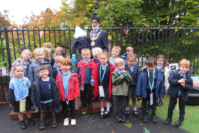 Cllr Parminder Singh Birdi, Warwick Mayor with children from Westgate Primary School and their Guy. Photo supplied