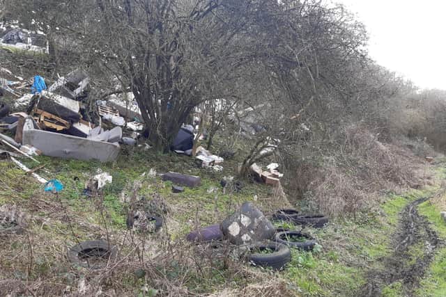 Criminals have created a huge fly-tipping site near Rugby along the old Lias Line.