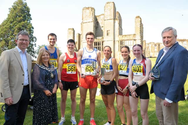 Left to right – Jeremy Wright MP, Kenilworth Town Mayor Alix Dearing, male third place runner David Brewis, male second place runner Scott Hudspith, male winner Callum Hanlon, women’s winner Kelly Edwards, women’s second place runner Natalie Bhangal, women’s third place runner Olivia Bailey and David Lester, senior partner at Blythe Liggins Solicitors. Picture supplied.