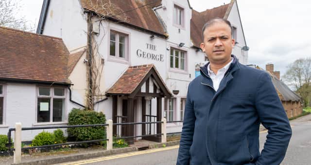 Hari outside The George in Kilsby.