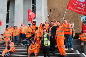 Workers holding a protest outside the town hall. Photo: Unite.