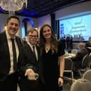 Ed and the team after receiving their award