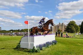 Emma Thomas, riding Icarus X, during the cross country phase at the Defender Burghley Horse Trials, in the parkland of Burghley House last year.
