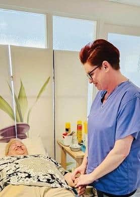 Anne works her magic on a client.