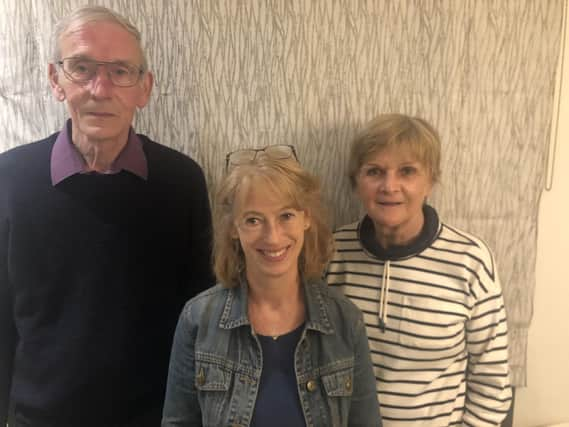 Pictured in the centre is Fiona Clayton, the Mid-Warks Amnesty Group chair with members who met with Matt Western MP: Keith Thompson and Belinda Pyke.