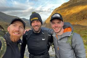 James Lennon (right) pictured with Alex Myers and fellow climber Craig Jones on a previous Snowdon climb. Photo supplied