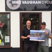 Mike Vaughan with his colleague Dan. Mike Vaughan Cycles have donated a specialised front and rear cycle light set as a prize for the calendar.