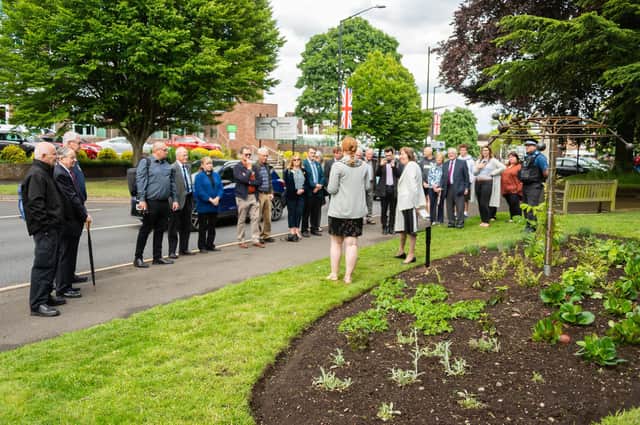 Sam Cooke (Mayor of Kenilworth), Jon Holmes (sculpture artist) and Sidney Syson (vice chair of Warwick District Council) conducted an unveiling of a new Covid sculpture to honour those who died in the pandemic, at Jubilee House.