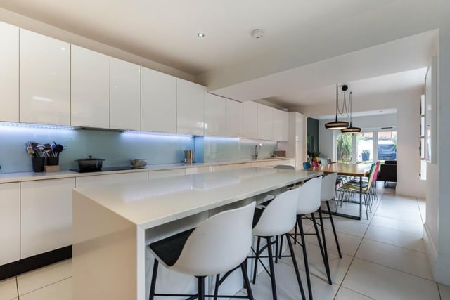 The open plane kitchen and dining area. Photo by Fine and Country