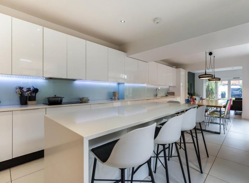 The open plane kitchen and dining area. Photo by Fine and Country