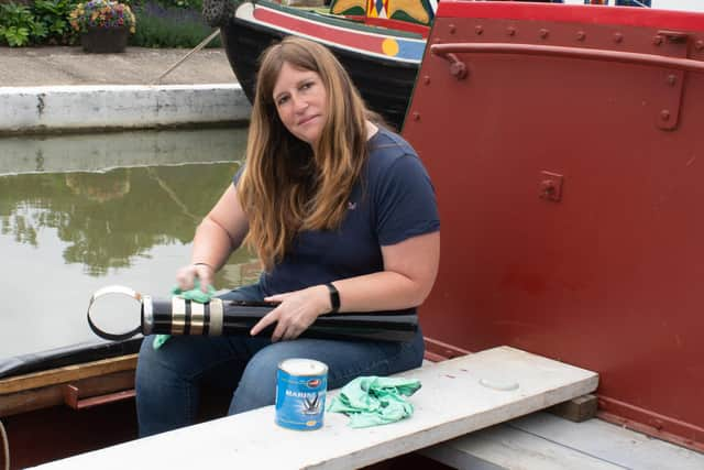 Sarah Edgson polishes an exhaust pipe. Picture by Pat Joyce.