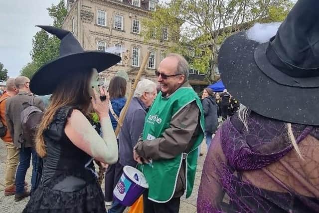 Dave Skinner, Warwick Town Councillor with two of the witches from Slaughterhouse Players. Photo supplied by Safeline staff and volunteers
