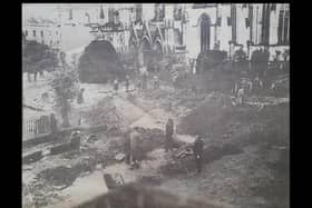 A bomber crater near the parish church, Leamington, October 1940, which caused considerable damage and one fatality.