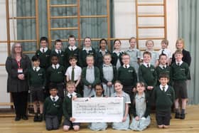 Year 4 were delighted to present a cheque after all their fundraising efforts.