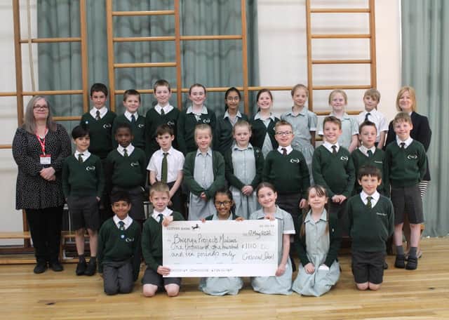 Year 4 were delighted to present a cheque after all their fundraising efforts.