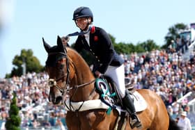Bronze medalist Laura Collett with horse London 52 of Team Great Britain celebrates a lap of honour after the medal ceremony for the Eventing Individual Final on day three of the Olympic Games Paris 2024 at Chateau de Versailles. (Photo by Kevin C. Cox/Getty Images)