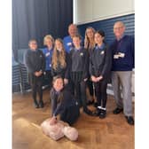 Four of the Kenilworth Heartsafe volunteer training team with some of the Year 8 pupils. Photo supplied