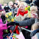 Queen Elizabeth II greets the crowds after visiting the Warwickshire Justice Centre on March 4, 2011 in Leamington Spa.