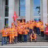 Striking workers outside the town hall on the day Rugby's new mayor was elected.