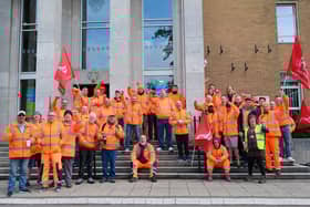 Striking workers outside the town hall on the day Rugby's new mayor was elected.
