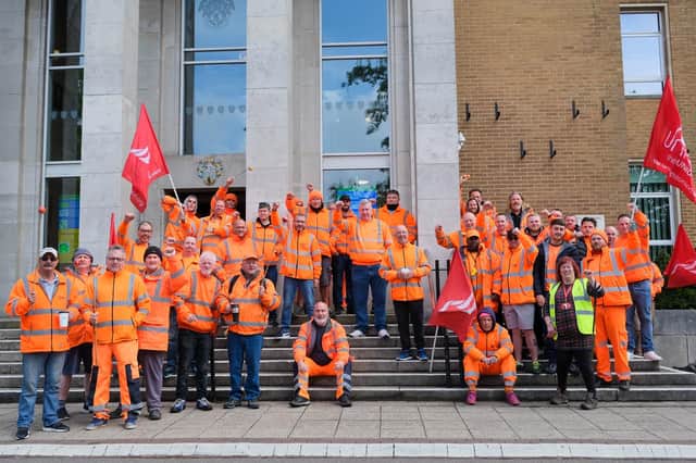 Striking workers outside the town hall on the day Rugby's new mayor was elected.