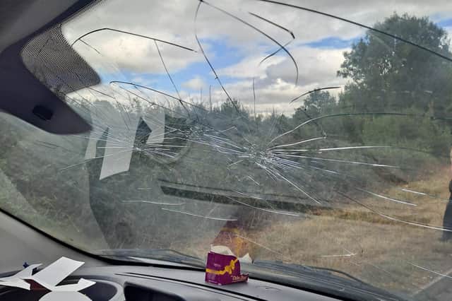 A cloned van found by police near Warwick 'appears to have had a disagreement with a hammer and front tyres resembling an F1 tyre' according to officers.
