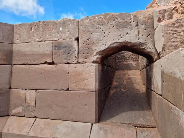 Musket ball impact marks on the outside wall of Coleshill gatehouse