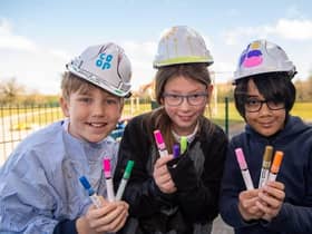 Heathcote Primary students wearing decorated hard hats and donated pens from David Wilson Homes. Photo supplied