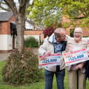 WIN IT TOGETHER: Graham, Victoria and Evelyn celebrate