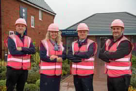 The DHS site team in pink PPE