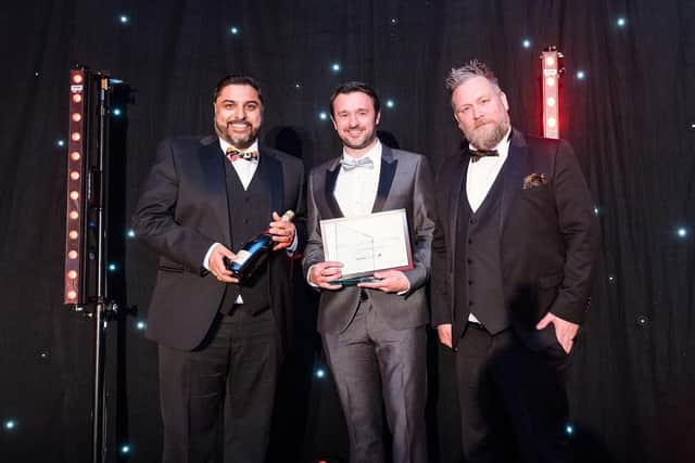 Coversure won Customer Service of the Year presented by Jamie Calder of Mr C's Cleaning Services. Photo by Vicki Head Photography