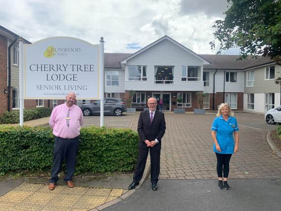 Warwick and Leamington MP Matt Western at Cherry Tree Lodge with home manager Scott Wincott (left)  and Wellbeing and Activities Lead Monique Smallwood (right).