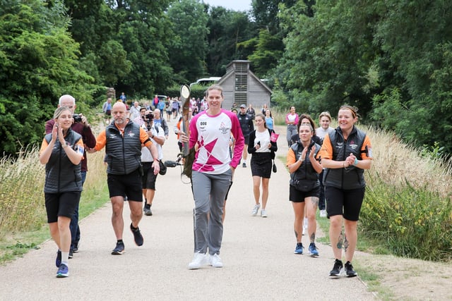 Batonbearer Sarah-Jane Perry holds the Queen's Baton during the Birmingham 2022 Queen's Baton Relay on a visit to Kenilworth on July 22 (Photo by Nick England/Getty Images for Birmingham 2022 Queen's Baton Relay)