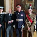 Lord Lieutenant Tim Cox with Martin Harrison (second from left) and the Lord Lieutenant’s cadets. Picture supplied
