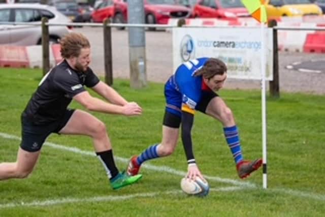 Louis Harvey scoring the first of his tries for Leamington Picture by Ken Pinfold.