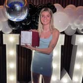 Kacie Elson is pictured with her manager's player of the season award for 2022-23 at Newcastle United Women.