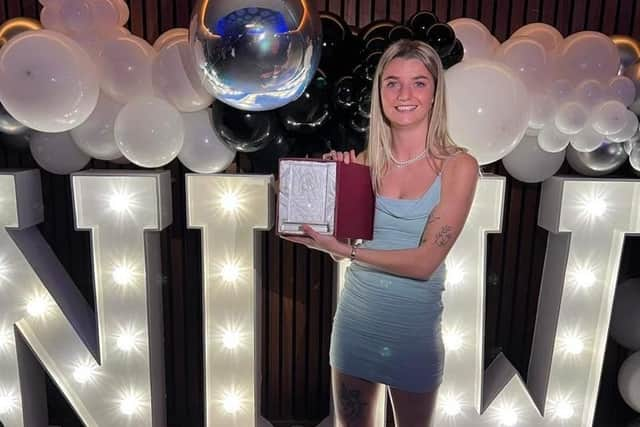 Kacie Elson is pictured with her manager's player of the season award for 2022-23 at Newcastle United Women.