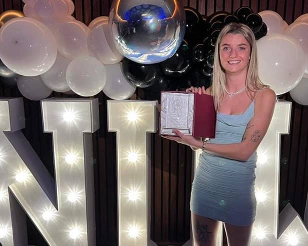 Kacie Elson is pictured with her manager's player of the season award for 2022-23 at Newcastle United Women.