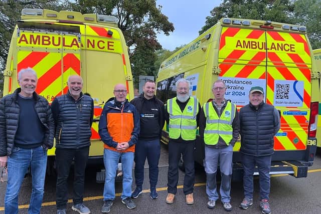 Warwick and Leamington Matt Western (third from the left) with the rest of the team of volunteers and the ambulances they drove to Ukraine in October. Picture supplied.