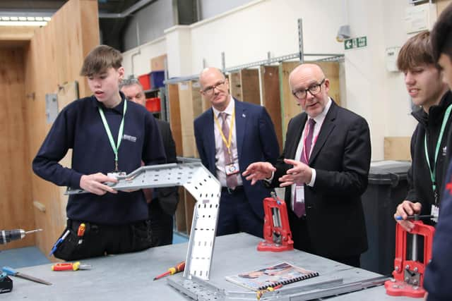 ): Matt Western MP speaking with staff and students at Royal Leamington Spa College.