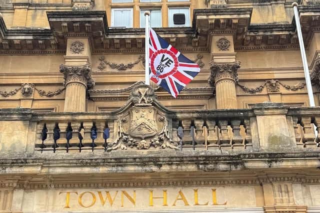 The VE Day 80th Anniversary flag at Leamington Town Hall. Credit: Susan Wheeler