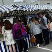 Around 10,000 people descended on Kenilworth for the food festival held in Warwick Road and Talisman Shopping Centre with many coming prepared for the weather conditions. Photo supplied