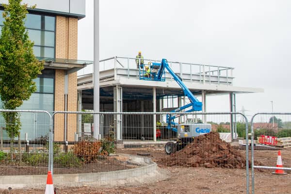The new units for KFC and Five Guys are starting to take shape.