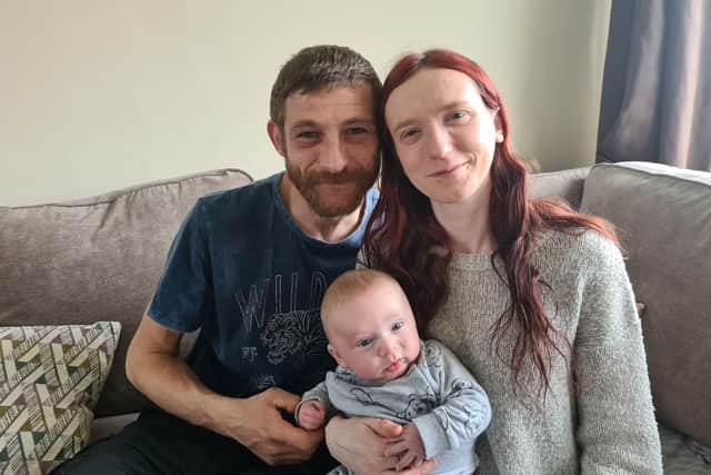 Simon Russell with his girlfriend Emily and their son Lucas. Photo supplied
