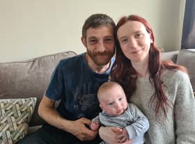 Simon Russell with his girlfriend Emily and their son Lucas. Photo supplied