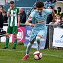 Theo Rowe takes on his man during Rugby's 1-1 draw with Bedworth on Saturday (Picture: Martin Pulley)