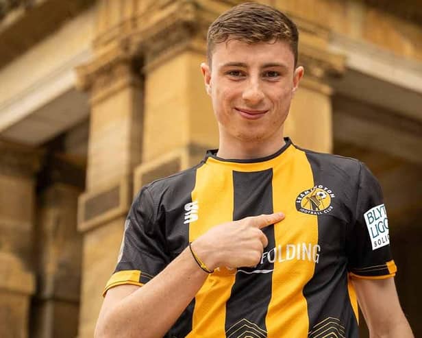 Leamington FC's new home shirt for the 2023/24 season modelled by striker Cally Stewart. Photo by Cameron Murray.
