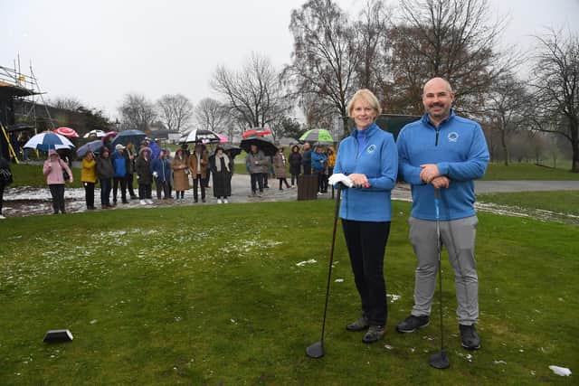 Supporters brave the elements to watch lady captain Bridget Jenkins and men's captain Tom Kiddie.
