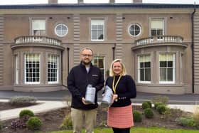 Matt Albutt, Digital Marketing Executive at Bromford, presenting the donated blankets to Emily Thompson, Community & Events Manager at Compton Care