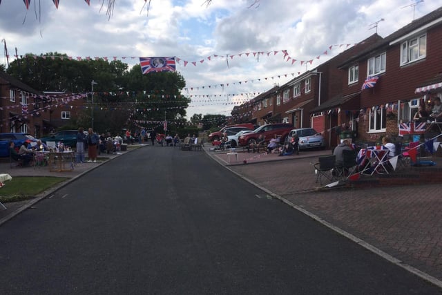 After the Royal Wedding and Diamond Jubilee street parties, Saville Grove in Kenilworth once again held a magnificent street party for the Platinum Jubilee with events such as bingo, quizzes, games, a scavenger hunt, BBQ and screening the Party from the Palace and big lunch. Every home has decorated a flag to make a special string of bunting and the Grove has magnificent decorations.